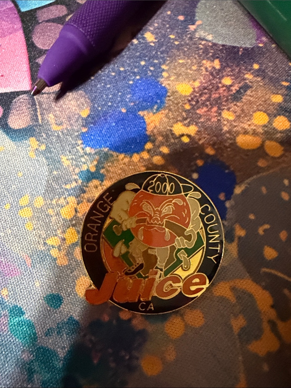 Orange County Juice 2000 Commemorative Enamel Pin - Black, Orange, Green